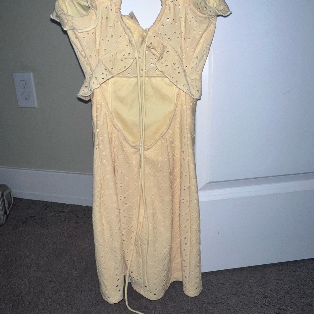 Jacinta Eyelet Ruffle Dress in Yellow
Brand new. Never worn. No tags. 
XSL63090